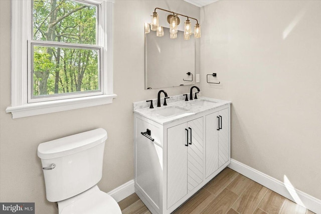 7746 Emerson Burrier Rd, Mount Airy, MD 21771 - bathroom with baseboards, a sink, and toilet