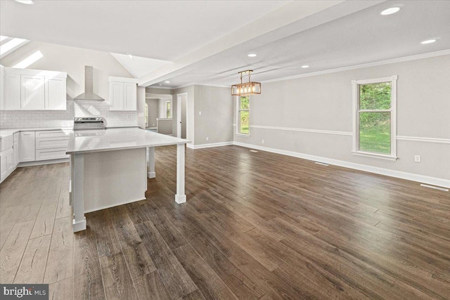 7746 Emerson Burrier Rd, Mount Airy, MD 21771 - kitchen featuring baseboards, wall chimney range hood, dark wood-type flooring, white cabinetry, and electric stove