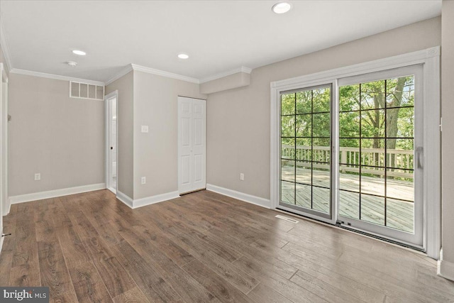7746 Emerson Burrier Rd, Mount Airy, MD 21771 - interior space featuring visible vents, baseboards, crown molding, and wood finished floors