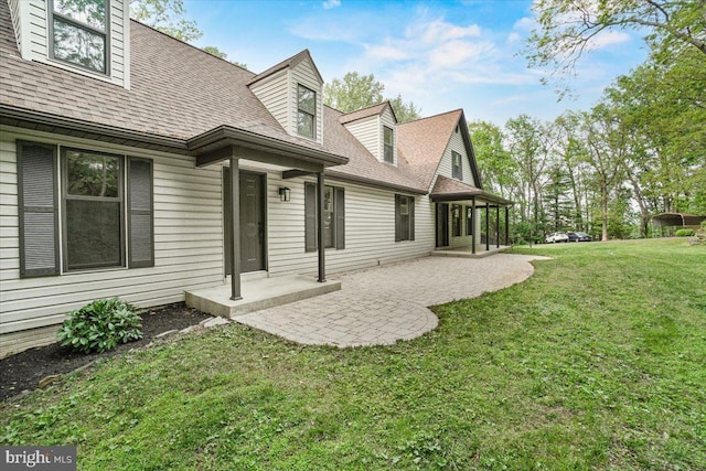 7746 Emerson Burrier Rd, Mount Airy, MD 21771 - rear view of property with a lawn, roof with shingles, and a patio area
