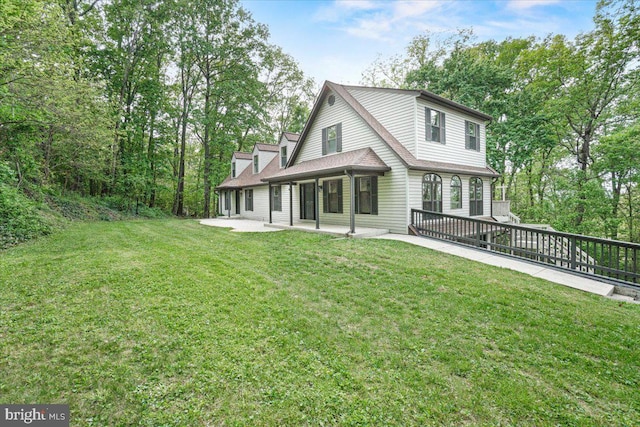 7746 Emerson Burrier Rd, Mount Airy, MD 21771 - rear view of house featuring a lawn and a patio area