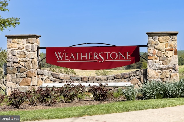 view of community sign