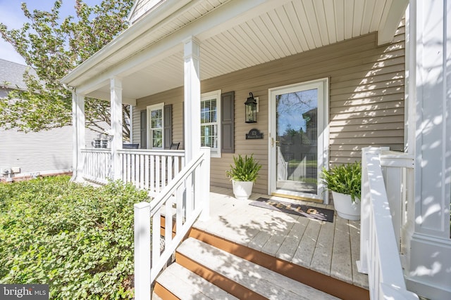 property entrance with a porch