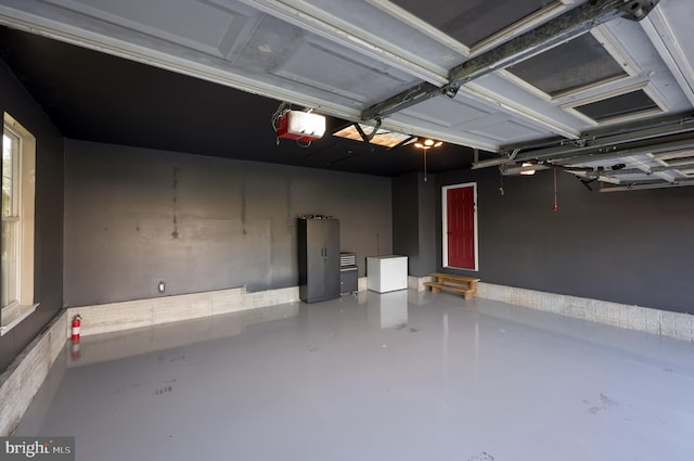 garage featuring a garage door opener