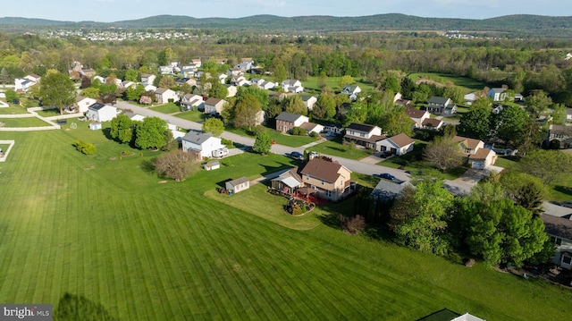 drone / aerial view with a residential view and a mountain view