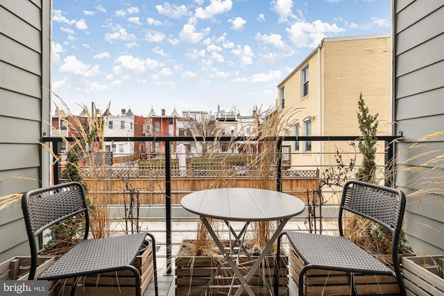 balcony featuring a residential view