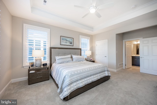 bedroom featuring light colored carpet, crown molding, and visible vents