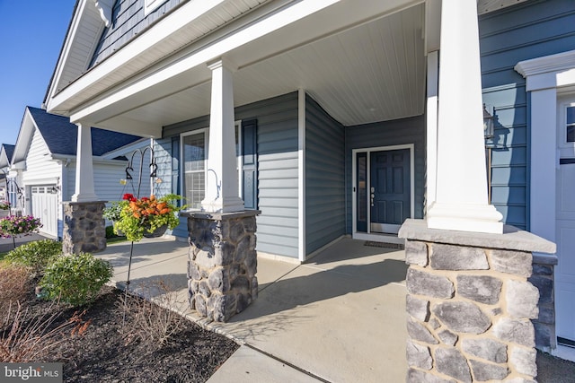 property entrance with covered porch