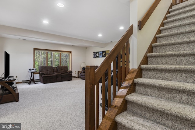stairway featuring baseboards, carpet, recessed lighting, and visible vents