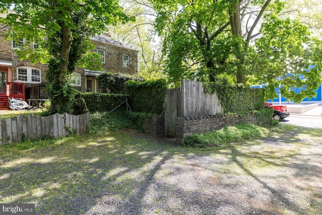 view of yard featuring fence