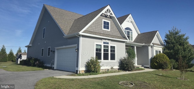 24840 Mistletoe Dr, Georgetown, DE 19947 - view of home's exterior with a yard, driveway, and roof with shingles