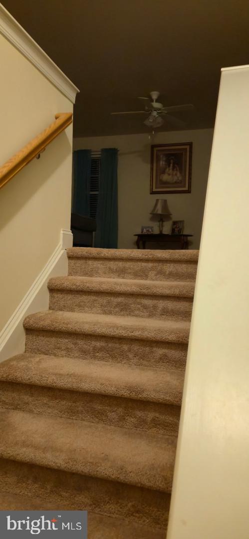 24840 Mistletoe Dr, Georgetown, DE 19947 - stairway featuring ceiling fan