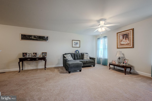 24840 Mistletoe Dr, Georgetown, DE 19947 - living room featuring ceiling fan, light carpet, and baseboards