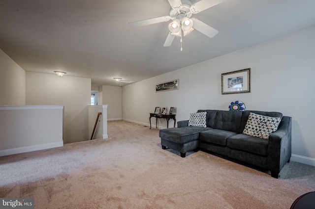24840 Mistletoe Dr, Georgetown, DE 19947 - carpeted living area with baseboards and ceiling fan