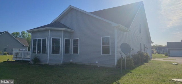 24840 Mistletoe Dr, Georgetown, DE 19947 - view of side of home with a lawn and a deck