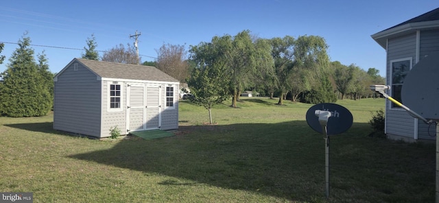 24840 Mistletoe Dr, Georgetown, DE 19947 - view of yard with a storage shed and an outdoor structure