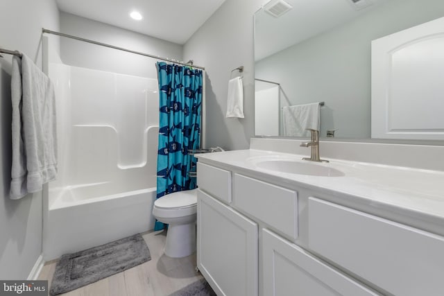 full bathroom with vanity, toilet, shower / bathtub combination with curtain, recessed lighting, and visible vents