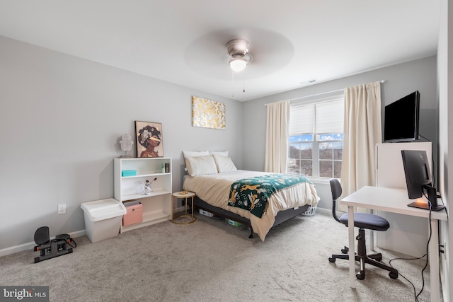 bedroom with baseboards, carpet, a ceiling fan, and visible vents
