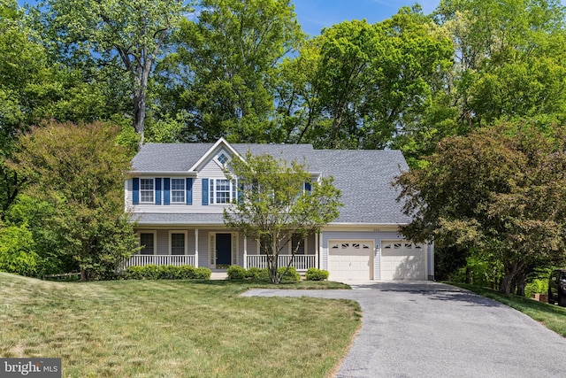 3001 Mandarin Pl, Waldorf, MD 20603 - colonial house featuring covered porch, a shingled roof, driveway, and a front yard