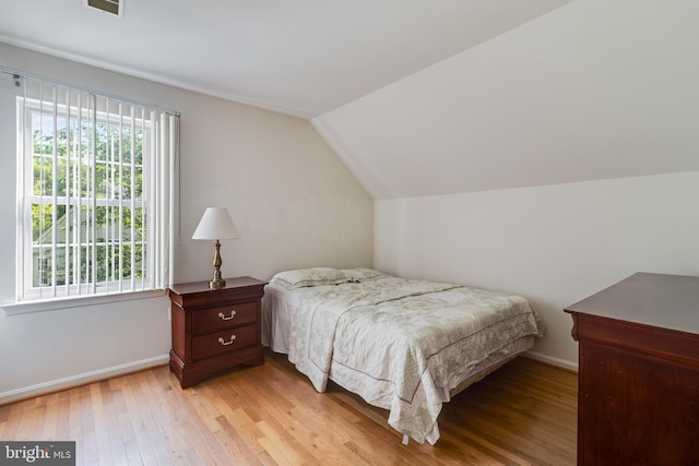 3001 Mandarin Pl, Waldorf, MD 20603 - bedroom with baseboards, vaulted ceiling, and light wood finished floors