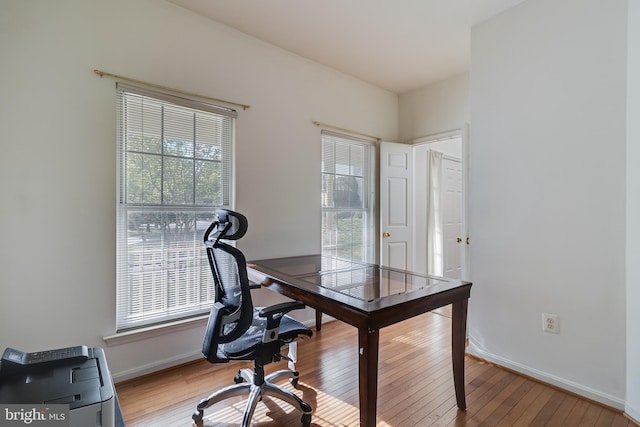 3001 Mandarin Pl, Waldorf, MD 20603 - home office with baseboards and light wood-style flooring