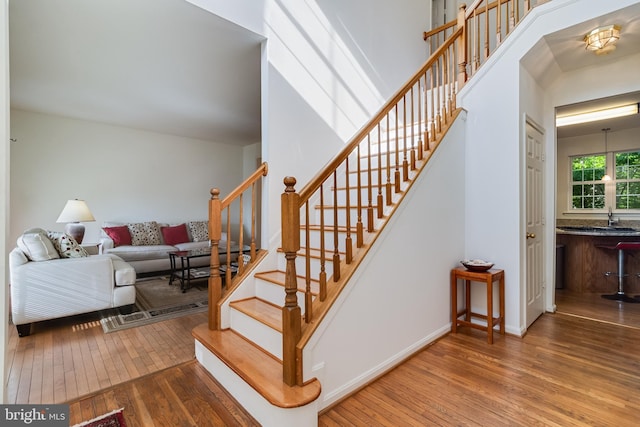 3001 Mandarin Pl, Waldorf, MD 20603 - staircase featuring baseboards and hardwood / wood-style floors