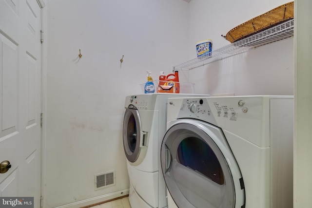 3001 Mandarin Pl, Waldorf, MD 20603 - laundry room featuring laundry area, visible vents, and washing machine and dryer