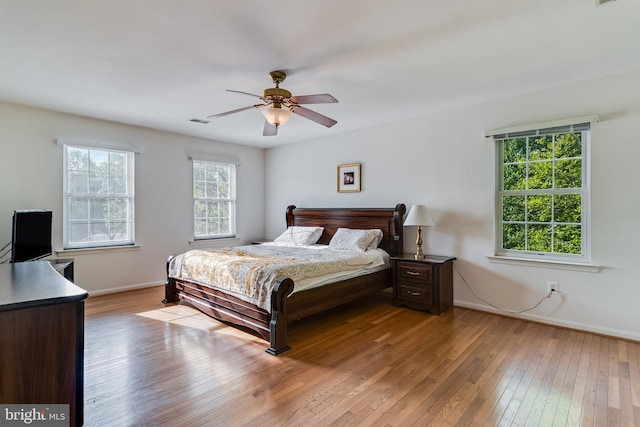 3001 Mandarin Pl, Waldorf, MD 20603 - bedroom featuring baseboards, ceiling fan, hardwood / wood-style flooring, and visible vents