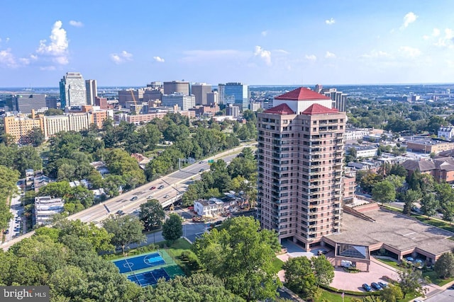 birds eye view of property featuring a city view