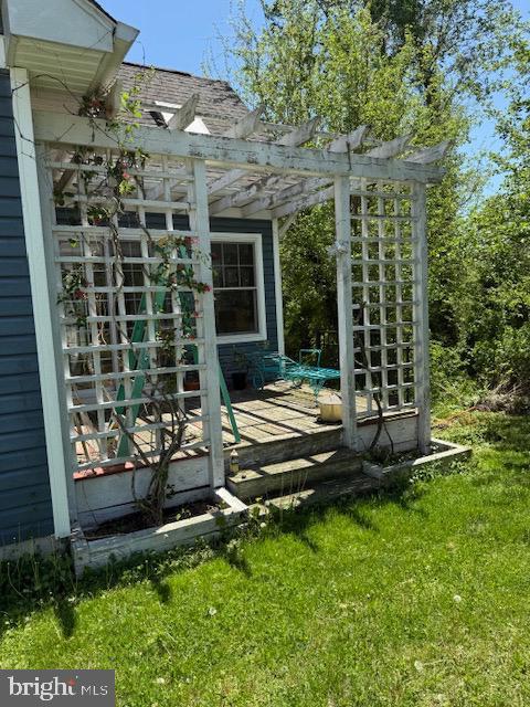 exterior space with a pergola