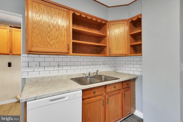 kitchen with backsplash, open shelves, dishwasher, a sink, and light wood finished floors