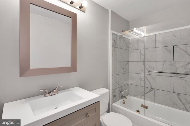 full bath featuring vanity, toilet, and bathing tub / shower combination