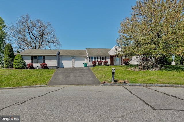 3 Dusty Rd, Easton, PA 18045 - view of front of property with a garage, aphalt driveway, and a front yard