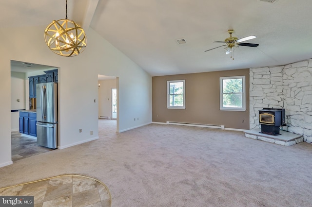 3 Dusty Rd, Easton, PA 18045 - unfurnished living room featuring a wood stove, high vaulted ceiling, ceiling fan with notable chandelier, a baseboard heating unit, and light carpet