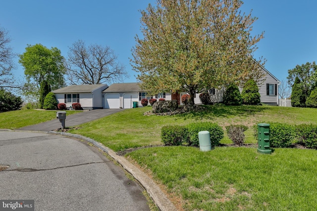 3 Dusty Rd, Easton, PA 18045 - view of front of property featuring driveway, a front lawn, and a garage