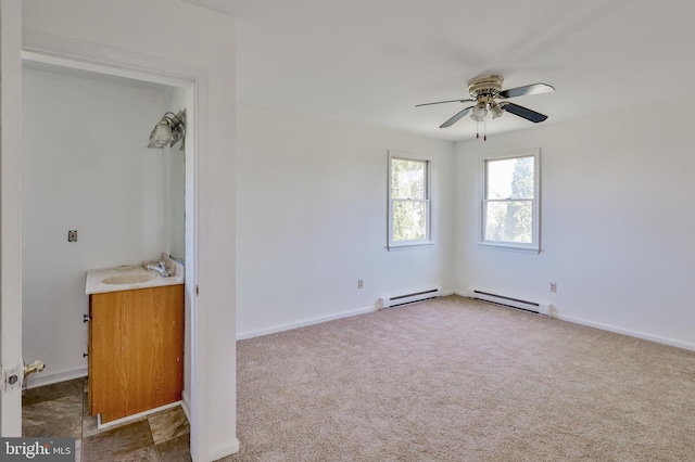 3 Dusty Rd, Easton, PA 18045 - unfurnished bedroom featuring carpet floors, baseboards, a baseboard heating unit, and a sink