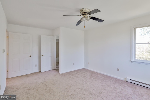 3 Dusty Rd, Easton, PA 18045 - unfurnished bedroom featuring baseboards, a baseboard radiator, carpet, and multiple windows