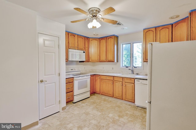 3 Dusty Rd, Easton, PA 18045 - kitchen with visible vents, white appliances, ceiling fan, light countertops, and a sink