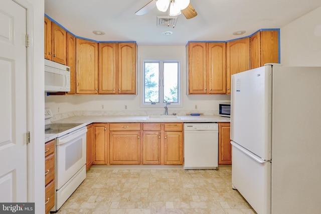 3 Dusty Rd, Easton, PA 18045 - kitchen with a ceiling fan, visible vents, a sink, light countertops, and white appliances