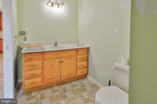 3 Dusty Rd, Easton, PA 18045 - bathroom featuring toilet, baseboards, and vanity