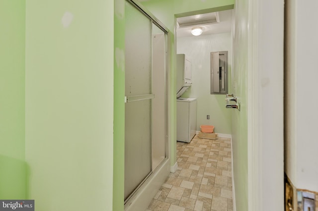 3 Dusty Rd, Easton, PA 18045 - bathroom with an enclosed shower, baseboards, stacked washer / dryer, and electric panel