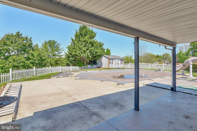 3 Dusty Rd, Easton, PA 18045 - view of patio / terrace with fence, a fenced in pool, and an outbuilding
