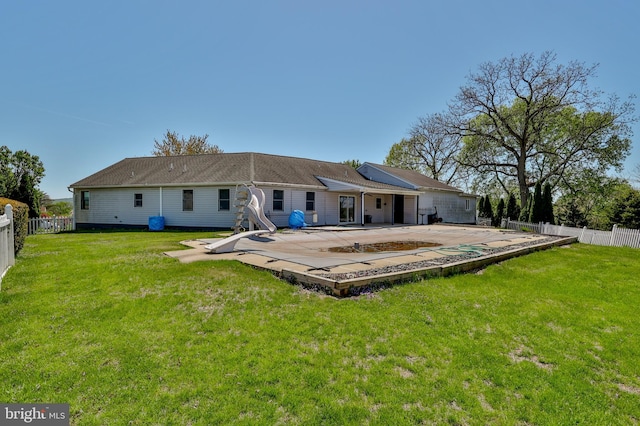 3 Dusty Rd, Easton, PA 18045 - rear view of house with a yard, a fenced backyard, and a patio area