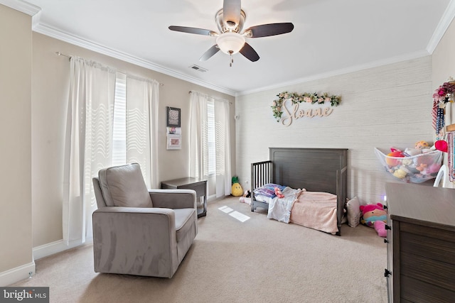 bedroom with ceiling fan, light carpet, baseboards, visible vents, and ornamental molding