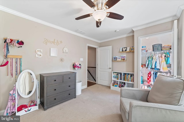 interior space with crown molding, ceiling fan, baseboards, visible vents, and a closet