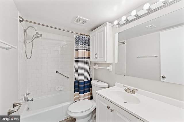 full bathroom featuring vanity, toilet, visible vents, and shower / bath combo with shower curtain