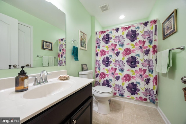 full bathroom featuring visible vents, tile patterned flooring, vanity, curtained shower, and toilet