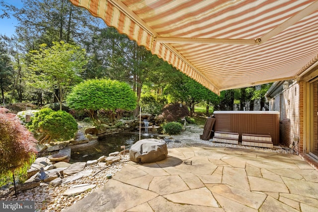 1219 Potomac School Rd, Mclean, VA 22101 - view of patio with a small pond and a hot tub