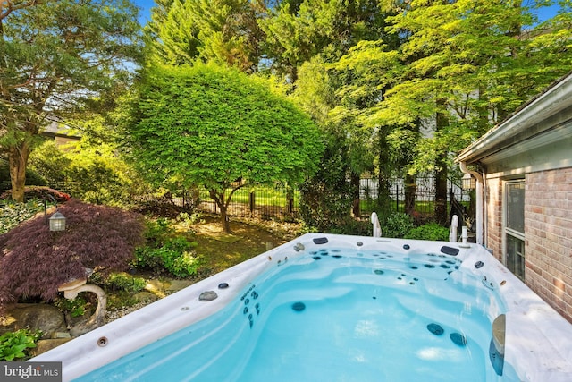 1219 Potomac School Rd, Mclean, VA 22101 - view of pool featuring an outdoor hot tub and fence