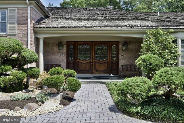 1219 Potomac School Rd, Mclean, VA 22101 - property entrance with brick siding and covered porch